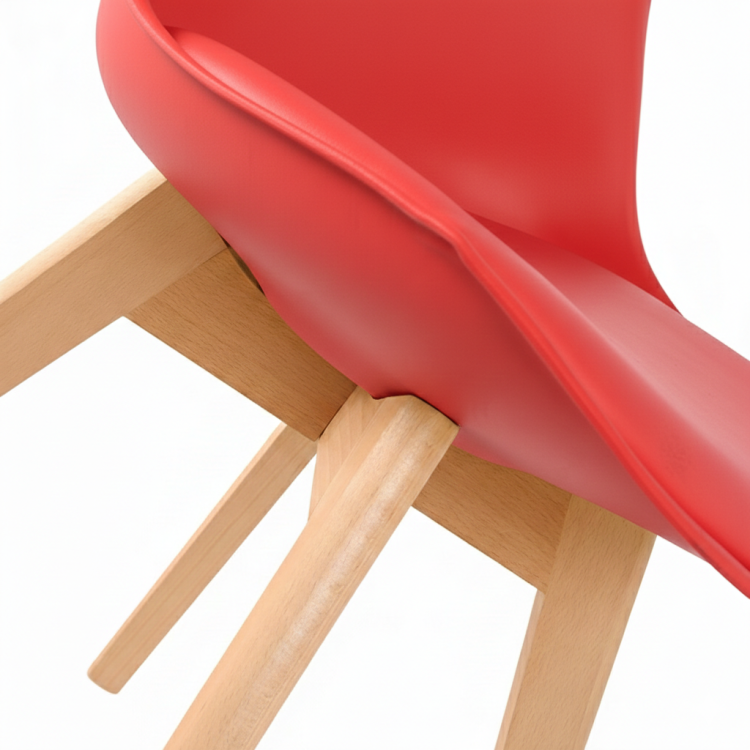 Czerwone siedzisko z ekoskóry z miękką poduszką krzesła F.H. Angel zblizenie siedziska.png